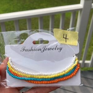 Set of 4 Stretchy anklets.  NWT.. handmade.